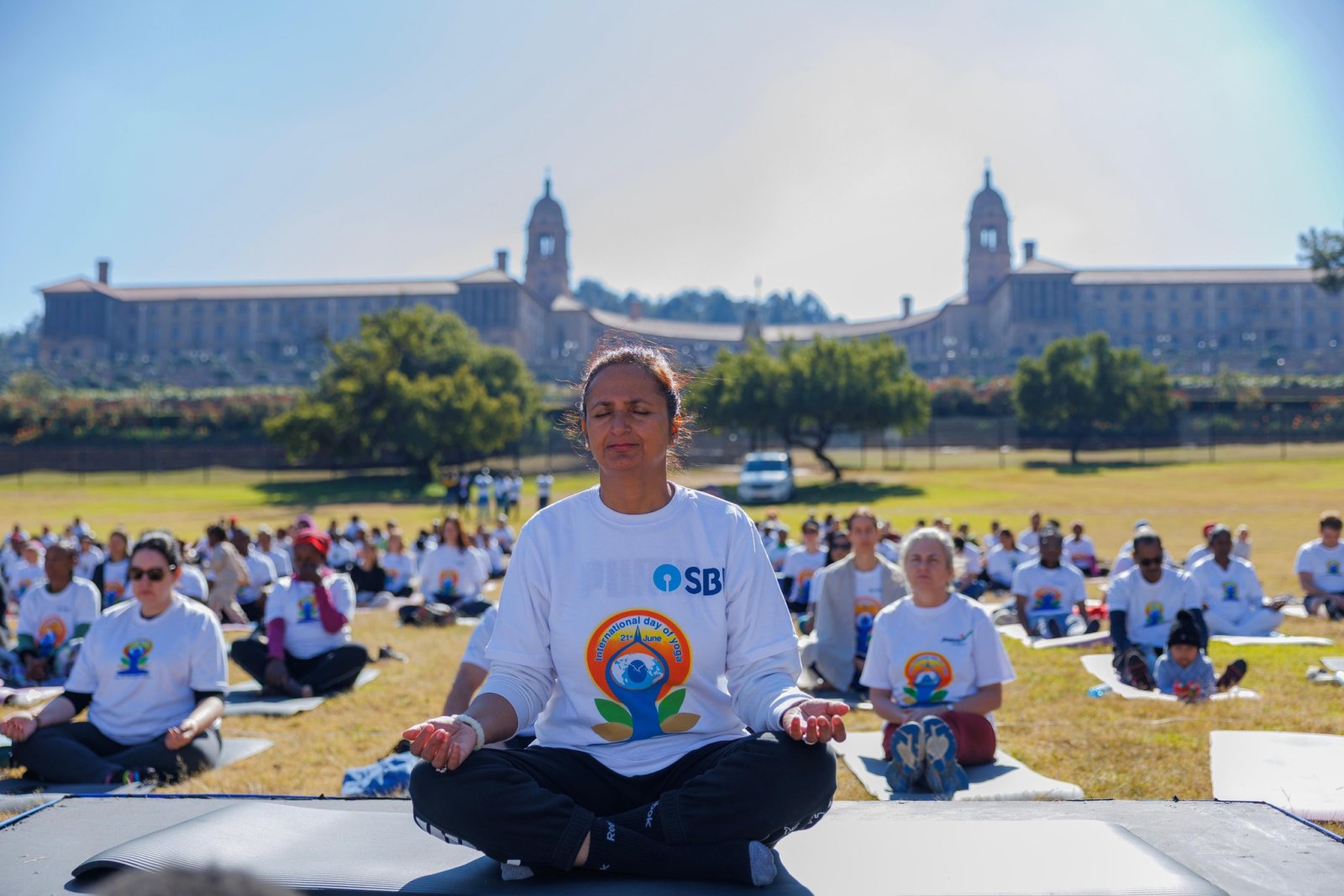 11th International Day of Yoga celebrated with great enthusiasm at the Iconic Union Building, South Lawns, Pretoria with the participation of South African & Indian community members.  The Yoga Trainers/ Teachers of various Yoga Institutes, kids, students enjoyed the various segments of Yoga i.e. Yoga poses/ asanas, meditation and laughter yoga.  On this occasion, High Commissioner Prabhat Kumar felicitated the Yoga Trainers.