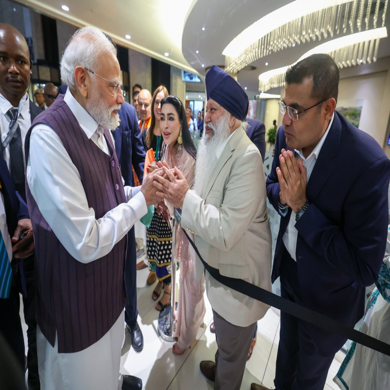 The Hon'ble Prime Minister of India Shri Narendra Modi deeply touched by the warm welcome from the Indian community on his arrival in South Africa to attend G20 South Africa.