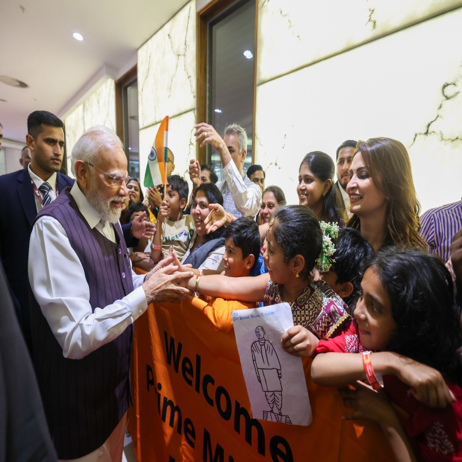 The Hon'ble Prime Minister of India Shri Narendra Modi deeply touched by the warm welcome from the Indian community on his arrival in South Africa to attend G20 South Africa.