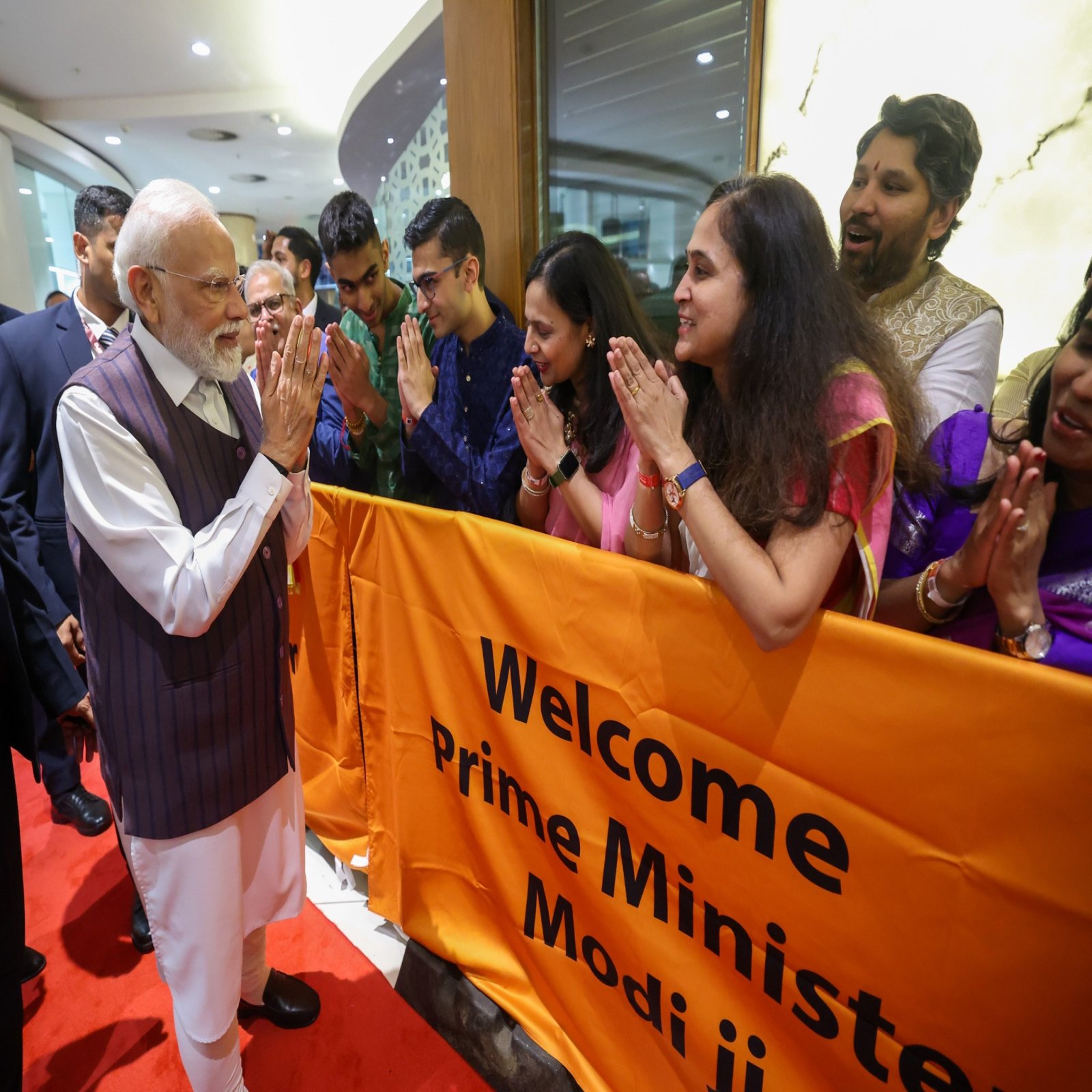 The Hon'ble Prime Minister of India Shri Narendra Modi deeply touched by the warm welcome from the Indian community on his arrival in South Africa to attend G20 South Africa.